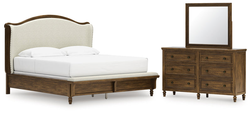 Sturlayne King Upholstered Panel Bed with Mirrored Dresser in Brown from Ashley - Lara Furniture