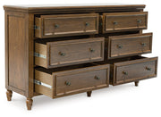 Sturlayne Queen Upholstered Panel Bed with Dresser and 2 Nightstands in Brown from Ashley - Lara Furniture
