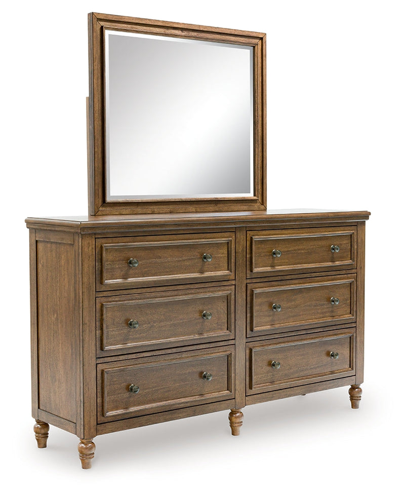 Sturlayne Queen Upholstered Panel Bed with Mirrored Dresser and Chest in Brown from Ashley - Lara Furniture