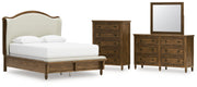 Sturlayne Queen Upholstered Panel Bed with Mirrored Dresser and Chest in Brown from Ashley - Lara Furniture