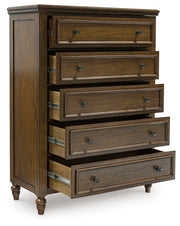 Sturlayne Queen Upholstered Panel Bed with Mirrored Dresser and Chest in Brown from Ashley - Lara Furniture