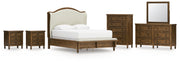 Sturlayne Queen Upholstered Panel Bed with Mirrored Dresser, Chest and 2 Nightstands in Brown from Ashley - Lara Furniture