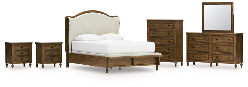 Sturlayne Queen Upholstered Panel Bed with Mirrored Dresser, Chest and 2 Nightstands in Brown from Ashley - Lara Furniture