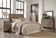 Trinell Queen Panel Headboard Bed with Dresser, Chest and 2 Nightstands in Brown - PKG005078