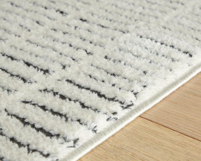 Turinwith Ivory/Black 7'10" x 9'10" Area Rug - R407551