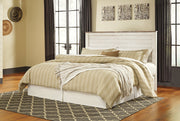 Willowton King/California King Panel Headboard Bed with Mirrored Dresser in Whitewash from Ashley - Lara Furniture