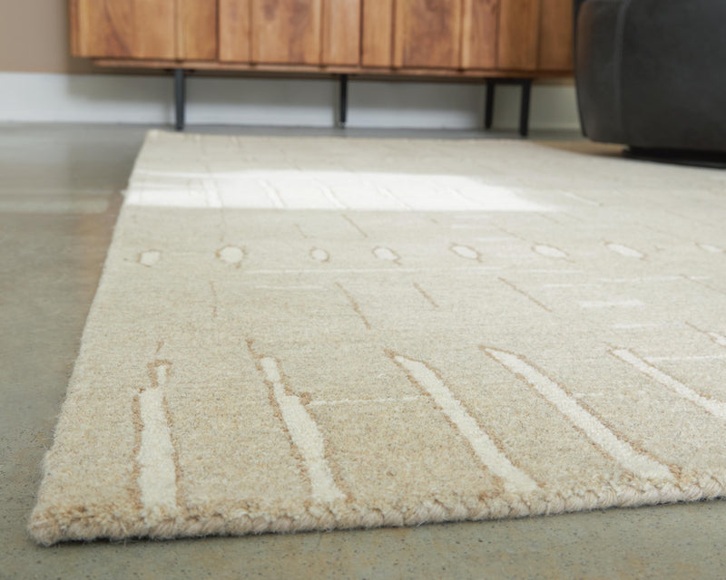 Wolbert Tan/Ivory 7'8" x 10' Area Rug - R407661