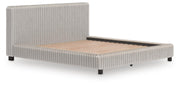 Zuraleus California King Upholstered Bed, Dresser, Mirror and Nightstand in White - PKG022858