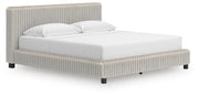 Zuraleus King Upholstered Bed, Dresser, Mirror and Chest in White - PKG022851