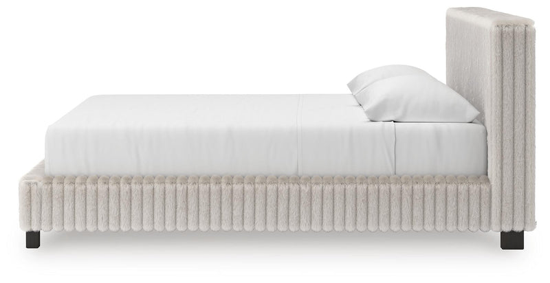 Zuraleus King Upholstered Bed, Dresser, Mirror, Chest and Nightstand in White - PKG022852