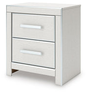 Zuraleus King Upholstered Panel Bed, Chest and  Nightstand in White - PKG022833