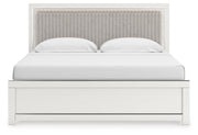 Zuraleus King Upholstered Panel Bed, Dresser, Mirror, Chest and Nightstand in White - PKG022836