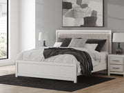 Zuraleus King Upholstered Panel Bed, Dresser, Mirror, Chest and Nightstand in White - PKG022836