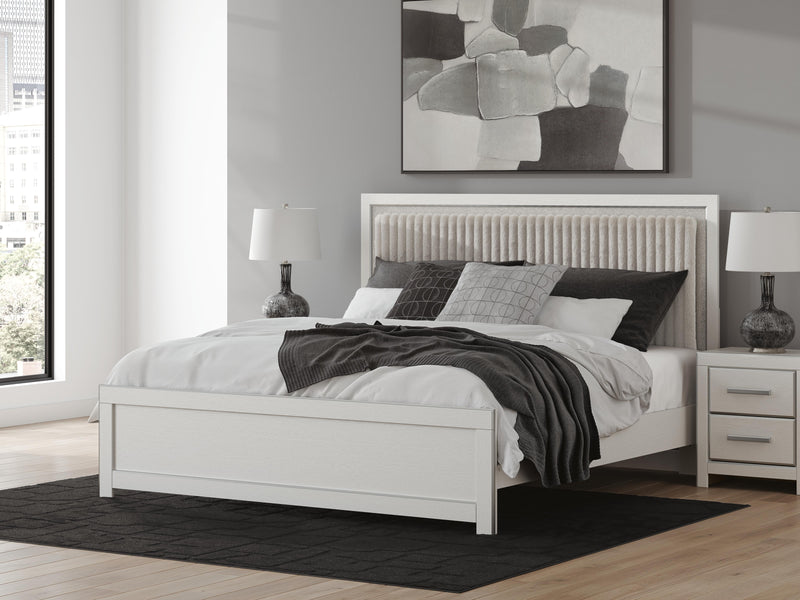 Zuraleus King Upholstered Panel Platform Bed, Dresser and Nightstand in White - PKG022822