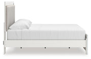 Zuraleus King Upholstered Panel Platform Bed, Dresser, Mirror and Chest in White - PKG022819