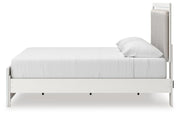 Zuraleus King Upholstered Panel Platform Bed, Dresser, Mirror and Chest in White - PKG022819