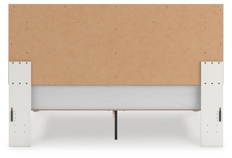 Zuraleus King Upholstered Panel Platform Bed, Dresser, Mirror and Nightstand in White - PKG022818