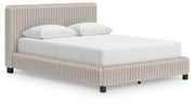 Zuraleus Queen Upholstered Bed, Dresser and Nightstand in White - PKG022846