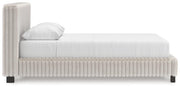 Zuraleus Queen Upholstered Bed, Dresser, Mirror and Nightstand in White - PKG022842