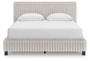 Zuraleus Queen Upholstered Bed, Dresser, Mirror, Chest and Nightstand in White - PKG022844