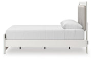 Zuraleus Queen Upholstered Panel Platform Bed, Dresser and Nightstand in White - PKG022798