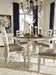 Realyn Chipped White Oval Dining Room Set - Lara Furniture
